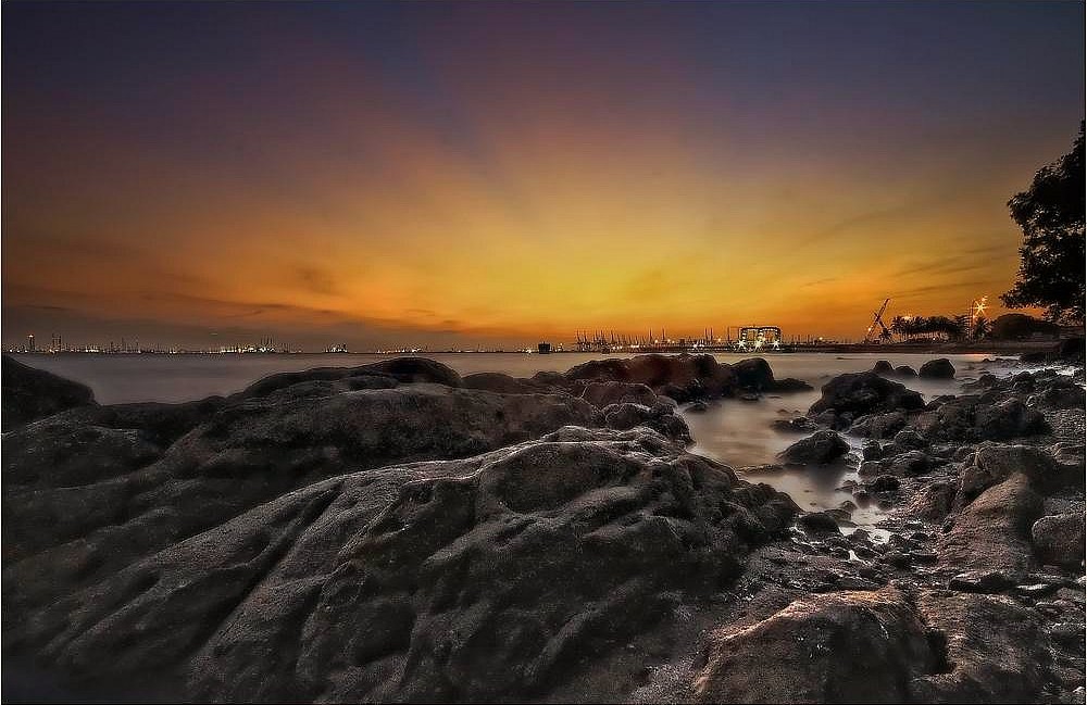 Sunset over the rocky coast at Labrador Nature Reserve, Singapore